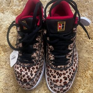 Nike Vapor Wing Tennis Shoes.